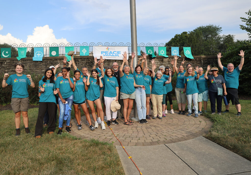 peace walk attendees pose for a picture before the walk